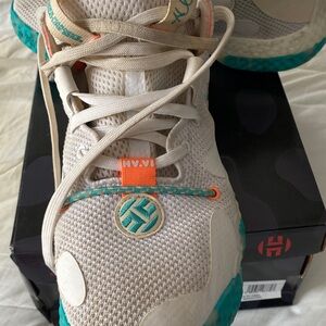 Adidas Sneakers with Teal and Beige Soles